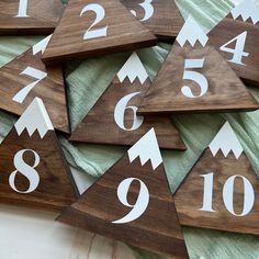 wooden numbers are arranged in the shape of mountains