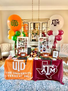 two tables with balloons and pictures on them