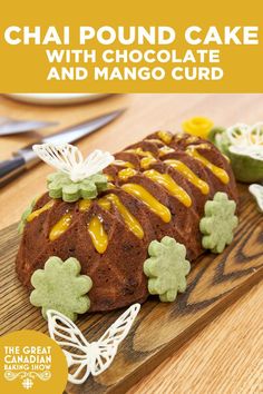 there is a cake with chocolate and mango icing on it