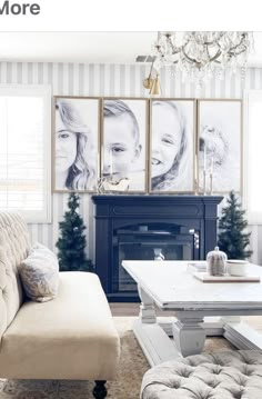 a living room filled with furniture and a fire place in front of a christmas tree