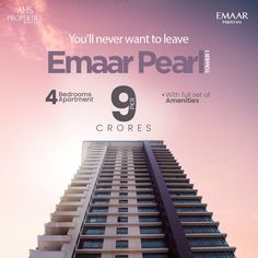 a tall building with the words emaar pearl on it's front and back