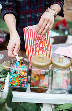 Popcorn with topping station | Backyard Fall Campfire Party via @IBTblog, pics by Aubree Edwards Photography Backyard Party Setup, Fall Campfire, Movie Theater Party, Diy Wedding Bar, Campfire Party, Bonfire Party, Candy Bar Party, Backyard Birthday