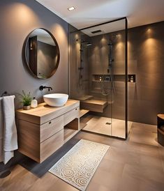 a bathroom with a sink, mirror and shower stall in it's own area