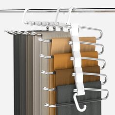 an over the door rack holds several folded fabrics