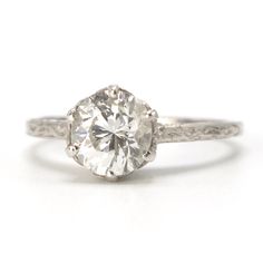 an old mine cut diamond engagement ring