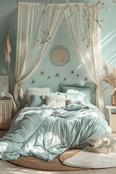 a bedroom with blue walls and white curtains