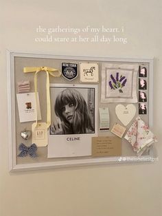 a bulletin board with pictures and magnets attached to it's sides, along with a message that reads the gathering of my heart i could stare at her all day long