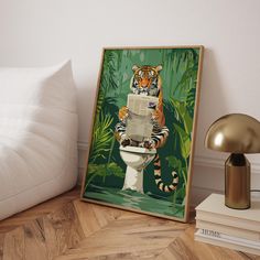 a tiger sitting on top of a toilet next to a white pillow and a lamp