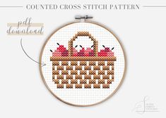 a cross stitch pattern with the instructions for how to sew an apple in a basket