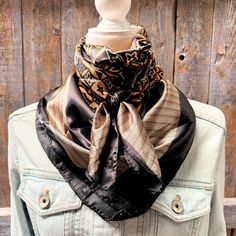 Our classic wild rag/scarf is black and yellow multi pattern with a geometric border. A perfect square - measuring 35"x35". Adding that extra touch of a western style to your outfit. 100% soft silk feeling polyester is durable to keep you warm in the cold and fashionable for any occasion. Plus it's machine washable ! Additional accessories are available- (Please see our slide options on our site) Leather slides Western concho slides Crystal concho slide Buckle slides Black Silk Scarf For Fall, Silk Scarf Western Outfit, Western Wild Rag Outfit, Western Scarf Cowgirl, Western Silk Scarves, Western Scarf, Wither Strap, Geometric Border, Beaded Dog Collar