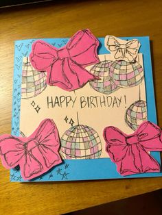 a birthday card with pink bows and a disco ball on the front that says happy birthday