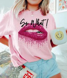 a woman with pink lipstick on her lips and the words so what? printed on it