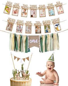 a baby is sitting in front of a cake with pictures on it and bunting