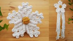 two crocheted snowflakes sitting next to each other on top of a wooden table