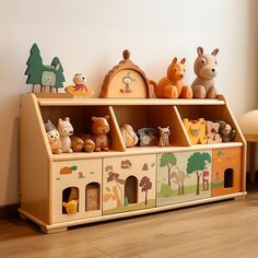 a wooden toy shelf filled with toys on top of a hard wood floor