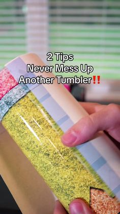 someone is holding a tube of glitter in their hand with the words, 2 tips never mess up another tumbler