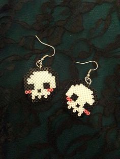 the earrings are made out of legos