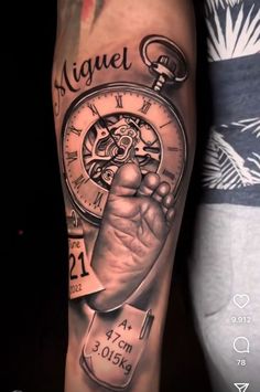 a man's arm with a clock and pocket watch tattoo on his left forearm