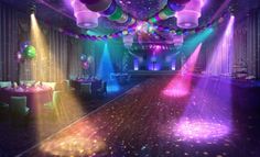 an image of a party setting with lights and balloons