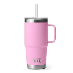 a pink yeti cup with a straw in it