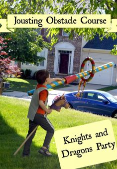 a young boy is playing with a toy in the yard