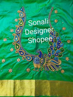 a green banner with gold trimmings and a peacock on it that says sonali designer shopee