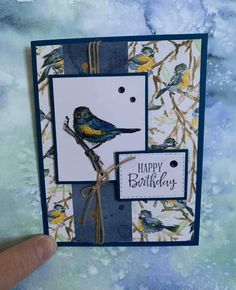 a handmade birthday card with a bird on a branch and the words happy birthday