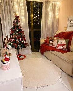 a living room decorated for christmas with lights