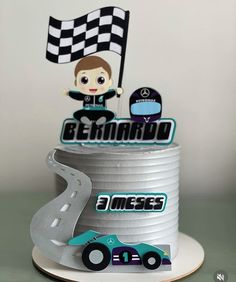 a birthday cake with a race car on top