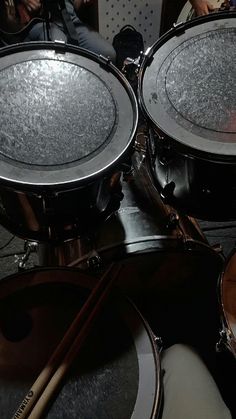 two drums are sitting next to each other