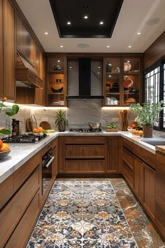 a kitchen with wooden cabinets and tile flooring, along with potted plants on the counter