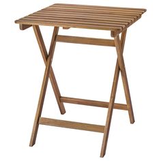 a wooden folding table on a white background