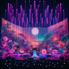 the stage is decorated with bright lights and flowers