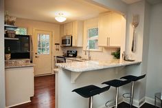 the kitchen is clean and ready for us to use in its new owner's home