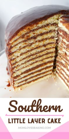 a layered cake with chocolate frosting on top and the words southern little layer cake