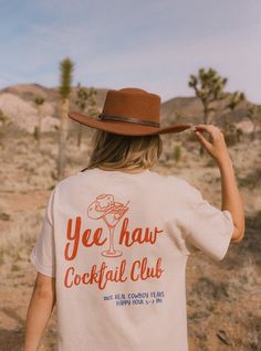 ✺ CUSTOM COASTAL COWGIRL SHIRT - YEE HAW - COCKTAIL CLUB SHIRTS ✺ * Q U I C K F A C T S * This design is a unique, one-of-a-kind awesome illustration that has been created in house. The design has a distressed effect, which gives a tee a worn-out look. This effect is intentional. ✺ 100% Cotton (fiber content may vary for different colors) ✺ Classic fit ✺ Sizing is unisex, so it fits both women and men (true to size) Please note that colours may appear different on different digital screens and may not be a true representation of the actual colours. This is a Unisex T-Shirt which you can use as an Oversize T-Shirt Dress, please check the dimensions to make sure you are happy with the size ! * K E E P S H O P P I N G *   * Shop our entire Bachelorette collection here: https://www.etsy.com/au Cowgirl Bachelorette Shirts, Coastal Cowgirl Bachelorette, Western Bachelorette, Cowgirl Bachelorette Parties, Last Rodeo, 30th Birthday Shirts, Cowgirl Bachelorette, Cowboy Aesthetic, Oversized T Shirt Dress