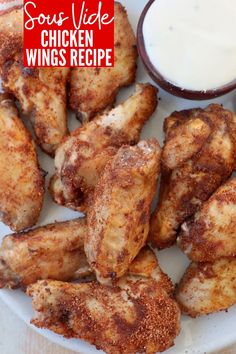 chicken wings with dipping sauce on a plate