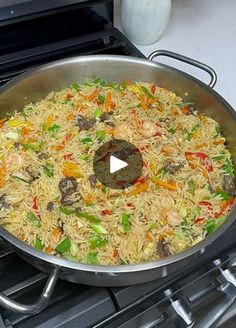 a pan filled with food sitting on top of an oven