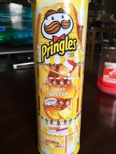 a can of pringles sitting on top of a table