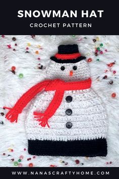 a crocheted snowman hat with red and black trim