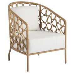 a white and gold chair with an armrest that is made out of rattan