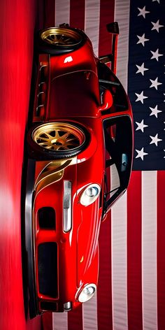 a red sports car in front of an american flag