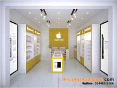 an apple store with yellow and white walls