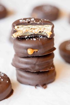 chocolate covered cookies stacked on top of each other