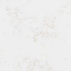 a white marble background with some brown speckles on the top and bottom half