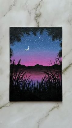 a painting on a marble surface with the moon in the sky above water and grass