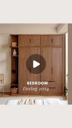 a bed room with a neatly made bed and wooden cabinets