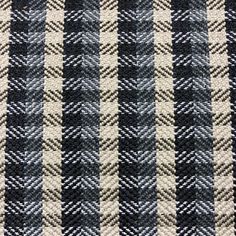 a black and white checkered fabric textured with some sort of clothing material