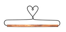 an iron and wood hanger with heart shaped wooden bar hanging from it's side