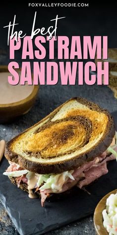 the best pastrami sandwich recipe is made with toasted bread and topped with coleslaw